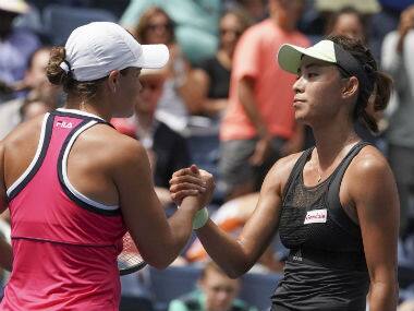 Off-colour Ashleugh Barty (left) missed forehands by miles and was visibly late on her backhands against Wang Qiang. AFP