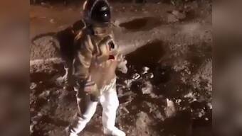 Man in spacesuit 'moonwalks' on crater-like potholes in Bengaluru; video goes viral on social media, Twitterati slams BBMP