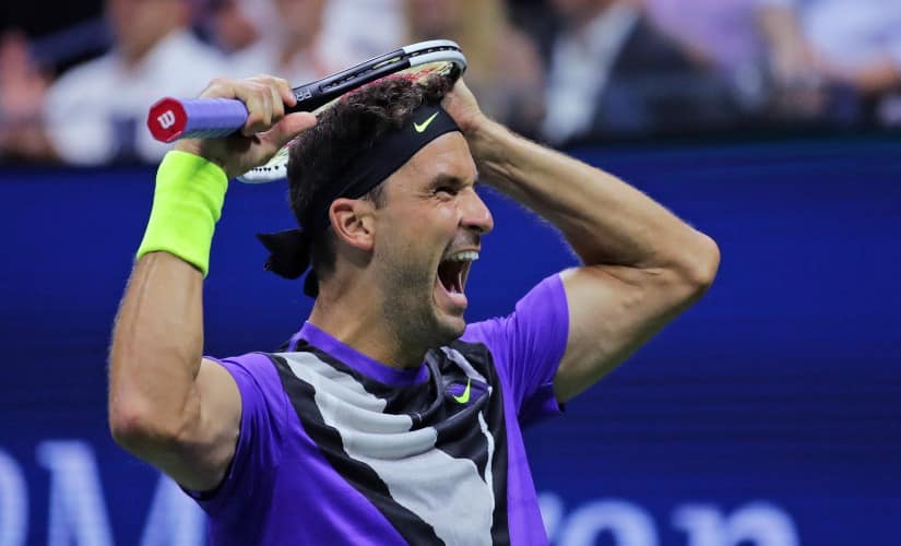 Grigor Dimitrov reacts after defeating Roger Federer. AP