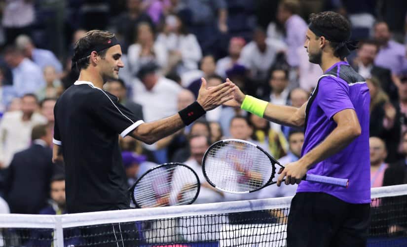 Grigor Dimitrov shakes hands after defeating Roger Federer during the quarterfinals of the US Open. AP