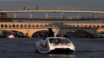 Electric boat that saves energy by floating on the water undergoes testing in Paris