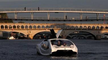 Electric boat that saves energy by floating on the water undergoes testing in Paris