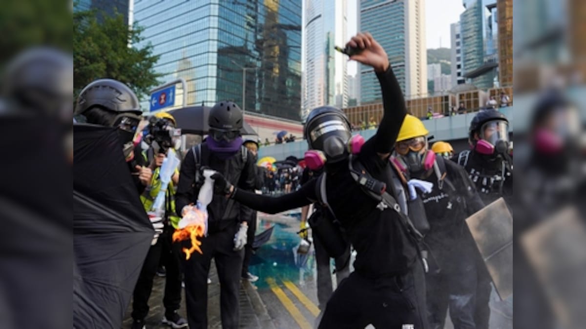 Hong Kong returns to violence after brief lull; protesters sing' God save the Queen', ask Britain to step up pressure on China