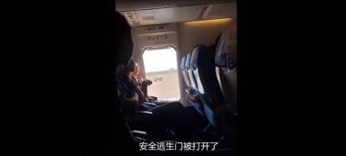 Woman aboard China's Xiamen Airlines opens flight's emergency door because she felt 'too stuffy', delays flight for an hour