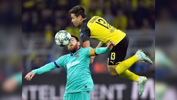 Champions League: Borussia Dortmund held to goalless draw by patchy Barcelona as Lionel Messi makes first appearance of season