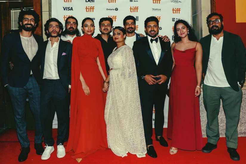 The cast and crew of Moothon at the TIFF red carpet
