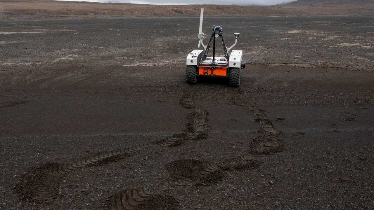 NASA's new robotic space explorer at theri base at the Lambahraun lava field in Iceland. Image Credit: Halldor Kolbeins/ AFP
