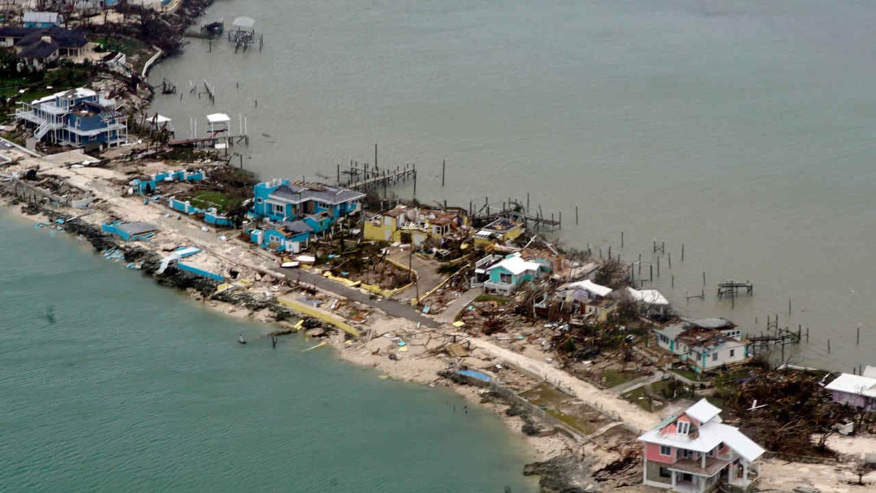 Overhead view of a row of damaged structures in the Bahamas from a Coast Guard Elizabeth City C-130 aircraft after Hurricane Dorian shifts north Sept. 3, 2019. Hurricane Dorian made landfall Saturday and intensified into Sunday. U.S. Coast Guard photo by Petty Officer 2nd Class Adam Stanton.