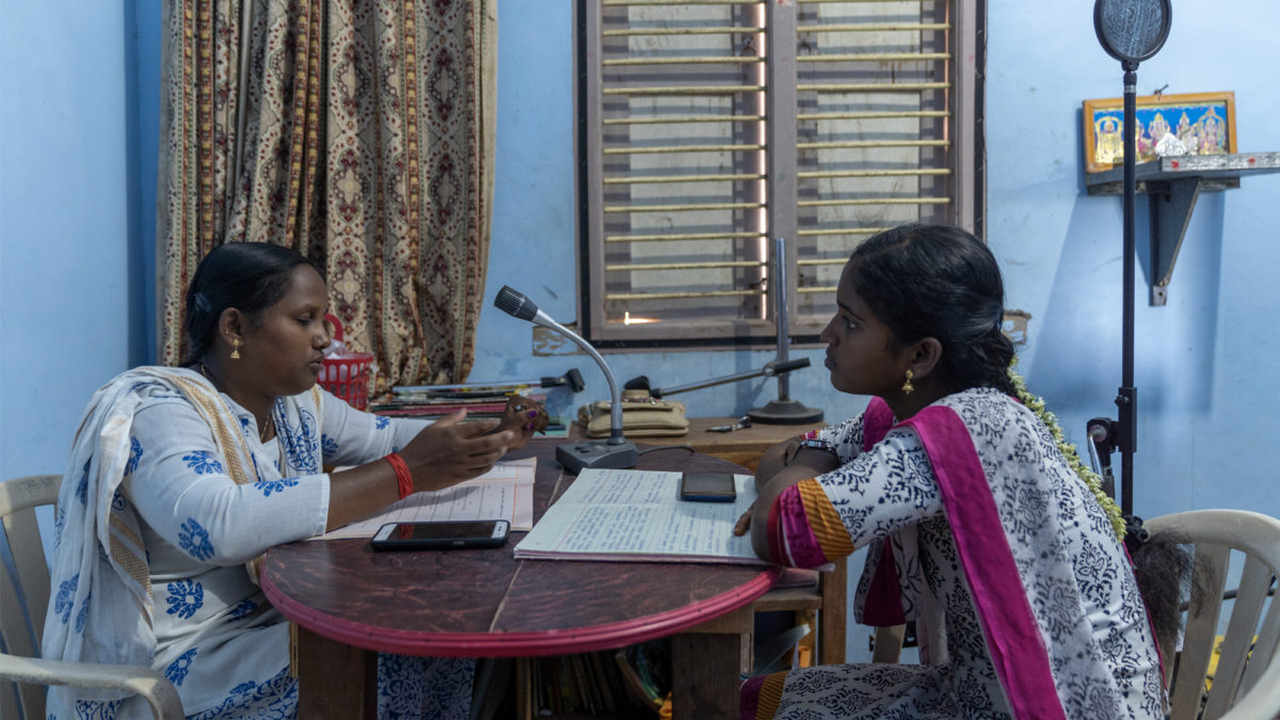 Ranjitha (L) and Durga (R) record a radio show at the community radio station about disaster preparedness in the coastal villages of Nagapattinam district. image credit: Kartik Chandramouli/Mongabay.