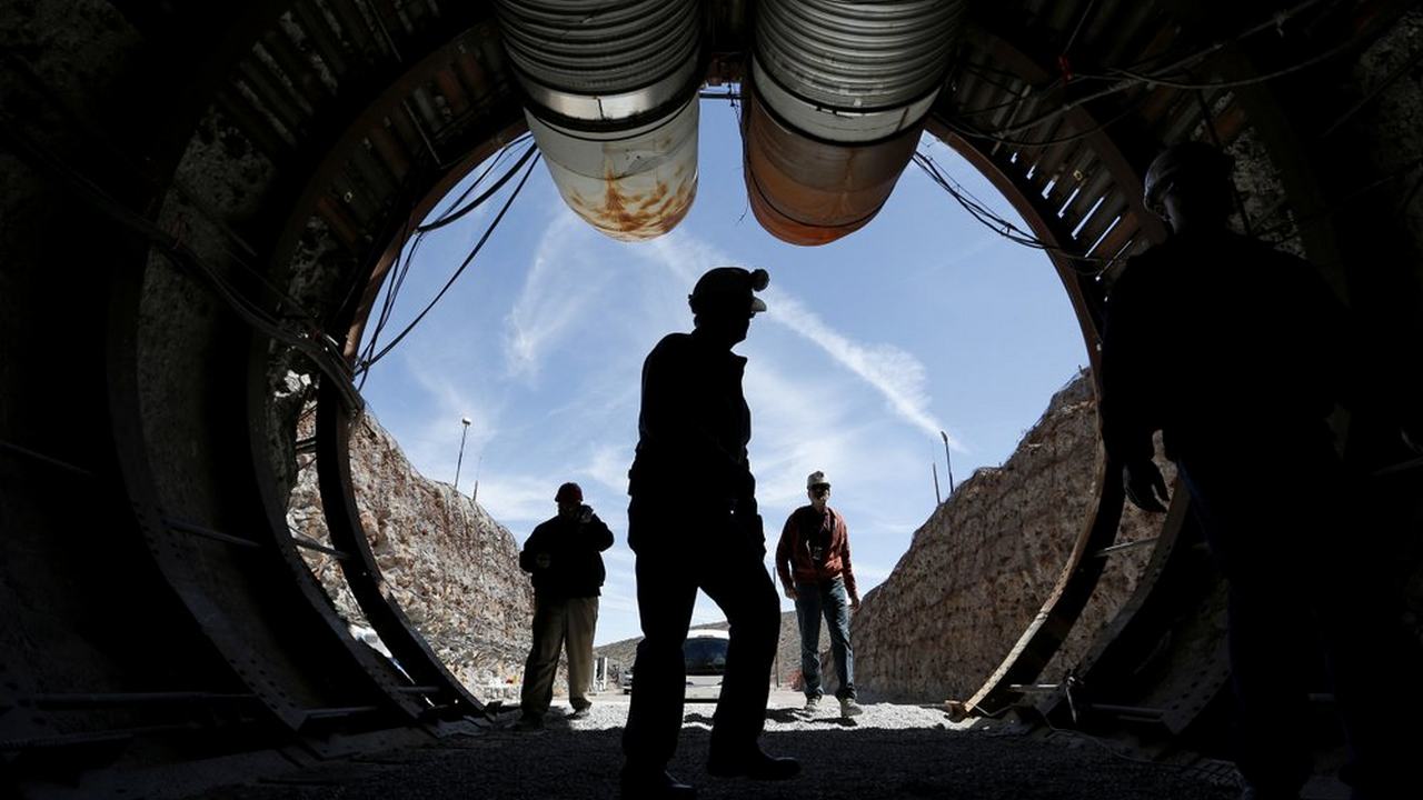 file photo, people walk into the south portal of Yucca Mountain during a congressional tour of the proposed radioactive waste dump near Mercury, Nev., 90 miles northwest of Las Vegas. image credit: AP