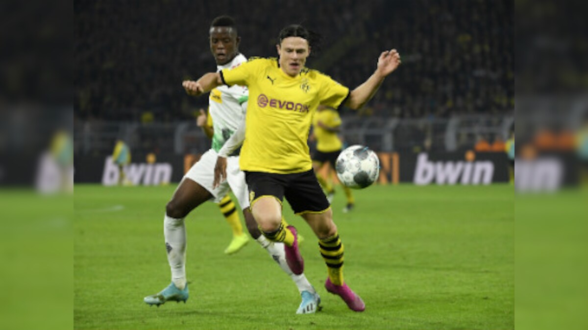 Bundesliga: Borussia Dortmund beat table toppers Gladbach; Bayern Munich held 2-2 by Augsburg