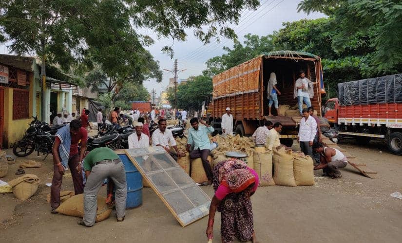 Latur has one of the biggest agriculture markets in the state. Farmers arrive at the mandi, sell their harvest, and buy material for their farm from the 118 shops lined up in the area. Firstpost/Parth MN