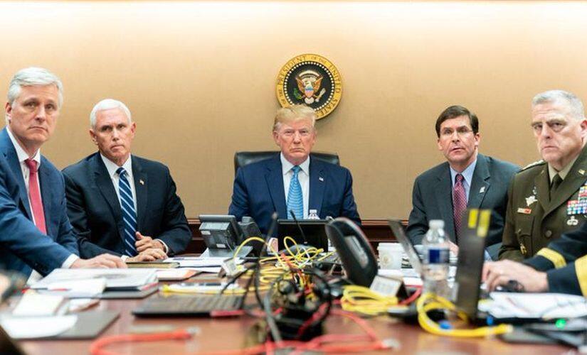 In a seemingly posed photo tweeted out Sunday by White House social media director Dan Scavino, Trump sits dead center, staring directly into the camera lens. Twitter/@WhiteHouse
