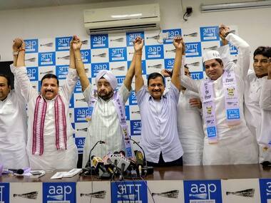Four-time Congress MLA Parlad Singh Sawhney joins Aam Aadmi Party in the presence of party chief and Delhi Chief Minister Arvind Kejriwal and MP Sanjay Singh in New Delhi. PTI