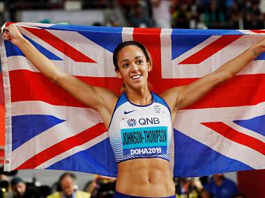 Katarina Johnson-Thompson, of Great Britain, celebrates after winning the gold medal in heptathlon at the World Athletics Championships in Doha. AP