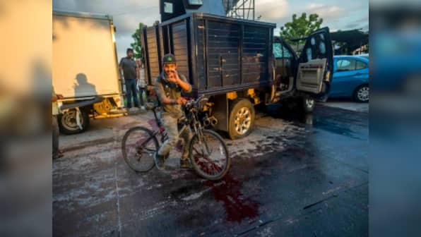 Mexican cartel gunmen force cops to free drug lord El Chapo's son; security minister says decision taken to maintain peace in city