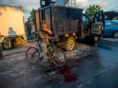 Mexican cartel gunmen force cops to free drug lord El Chapo's son; security minister says decision taken to maintain peace in city