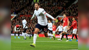Premier League: Liverpool drop first points but Adam Lallana's late strike denies rivals Manchester United victory