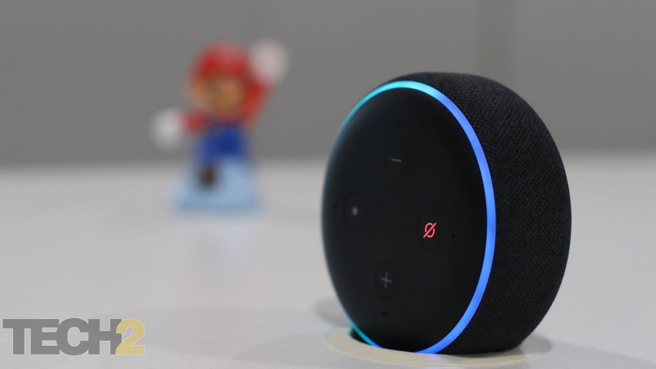 Amazon Echo Dot (3rd gen) comes with a cloth-covered speaker section and has four far-field microphones up top.