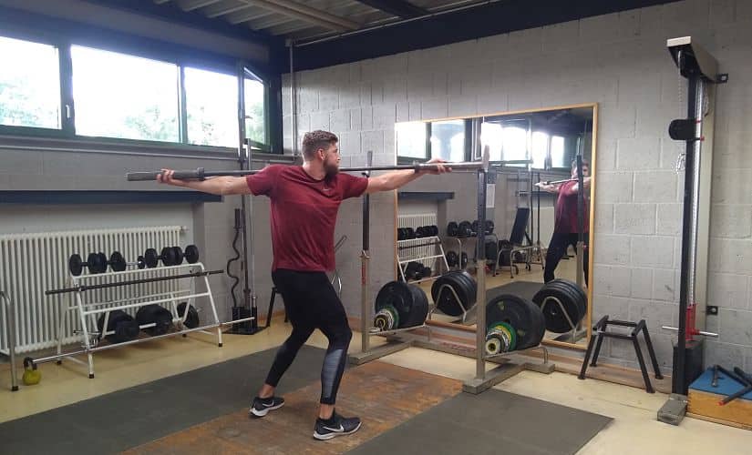 Andreas Hofmann warms up before weight training. Image: Amit Kamath