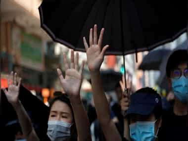 Hong Kong protesters stage sit-in outside school of 18-year-old who was shot by police during protests on Tuesday Hong Kong protesters stage sit-in outside school of 18-year-old who was shot by police during protests on Tuesday