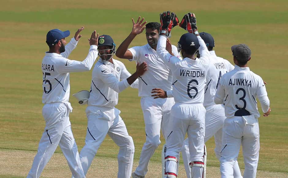 Ravichandran Ashwin celebrates after seeing off Theunis de Bruyn, who was the first to depart on the final day. AP 