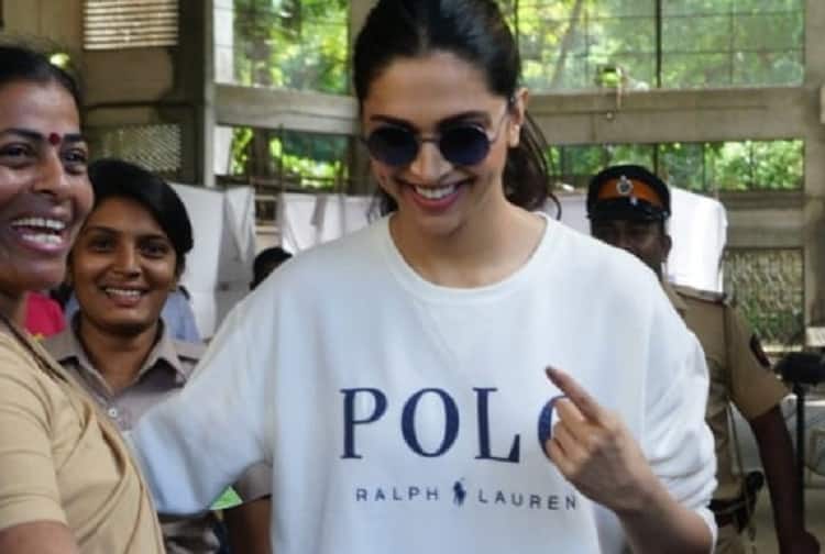 Deepika Padukone smiles for the paparazzi at a polling booth in Mumbai 