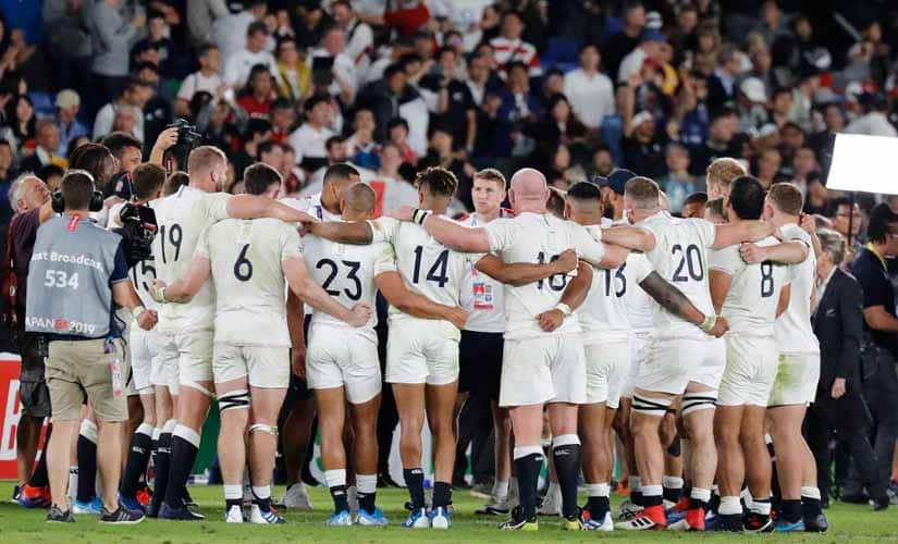 England players huddle after their 19-7 win over New Zealand in the Rugby World Cup semi-final. AP