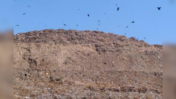 Living near Delhi's tallest garbage mountain, Ghazipur locals continue to gasp for fresh air