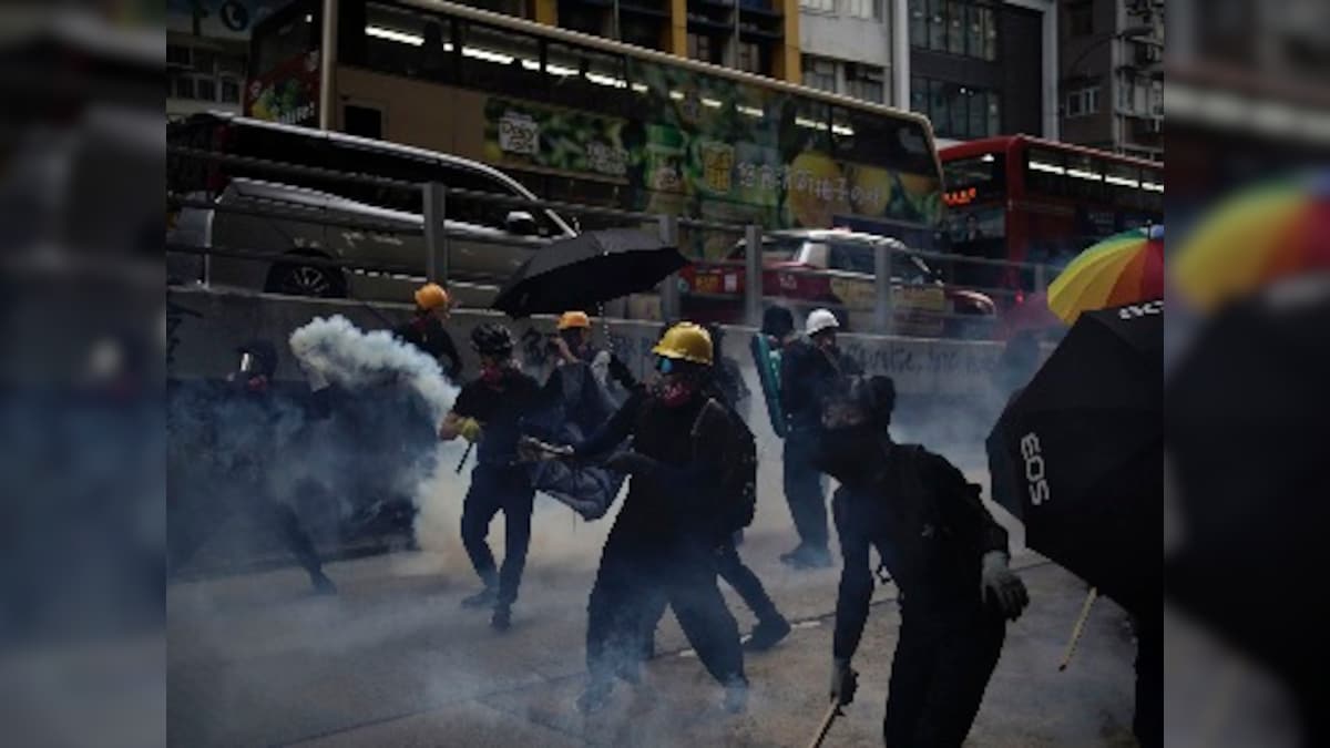 'Five demands, not one less': Hong Kong protesters erect barricades, throw firebombs; police fire tear gas, use water canons