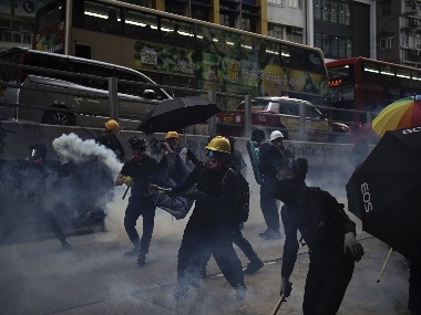 'Five demands, not one less': Hong Kong protesters erect barricades, throw firebombs; police fire tear gas, use water canons 'Five demands, not one less': Hong Kong protesters erect barricades, throw firebombs; police fire tear gas, use water canons