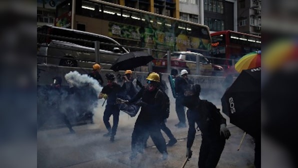 'Five demands, not one less': Hong Kong protesters erect barricades, throw firebombs; police fire tear gas, use water canons