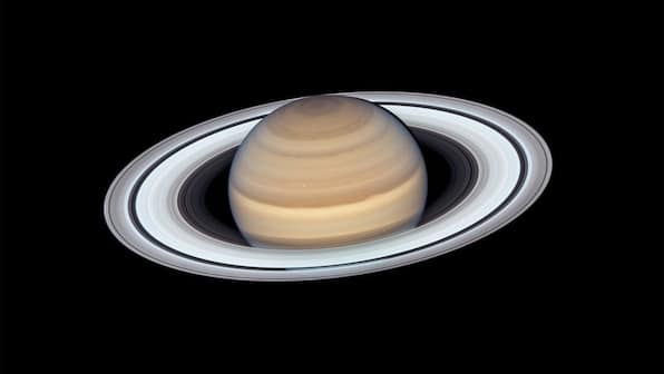Hubble captures five of Saturn's moons in a single, stunning photograph