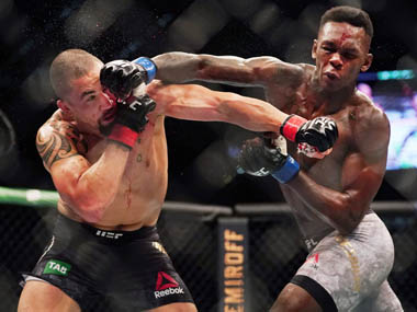 Israel Adesanya knocks out middleweight champion Robert Whittaker in front of record-breaking attendance at UFC 243 Israel Adesanya knocks out middleweight champion Robert Whittaker in front of record-breaking attendance at UFC 243