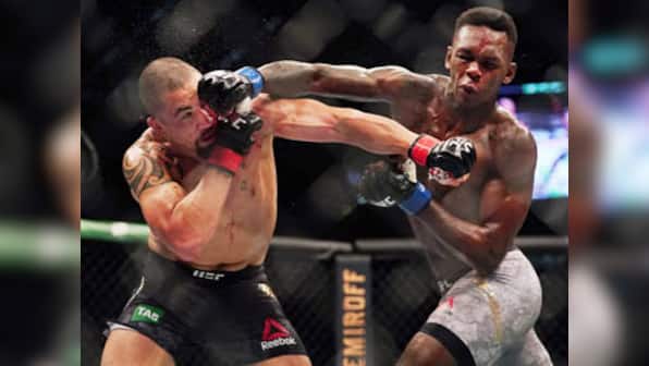 Israel Adesanya knocks out middleweight champion Robert Whittaker in front of record-breaking attendance at UFC 243