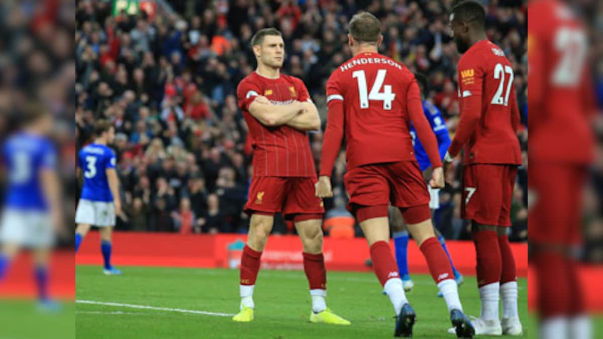 Premier League: Late James Milner penalty takes Liverpool eight points clear in first place; Tottenham rocked by Brighton