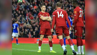Premier League: Late James Milner penalty takes Liverpool eight points clear in first place; Tottenham rocked by Brighton