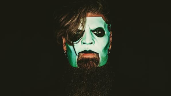 Slipknot's Jim Root thinks out loud about surviving in the metal industry, finding magnificence in chaos