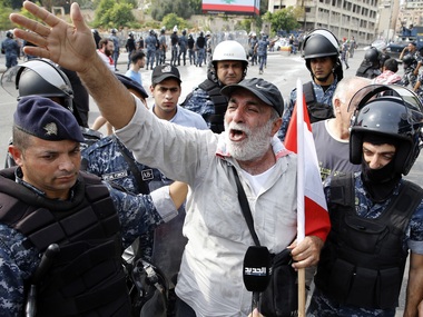 Protestors in Lebanon take to streets for 10th day, demand remove of 'systematically corrupt' political class; Hezbollah supporters defy call to stem unrest Protestors in Lebanon take to streets for 10th day, demand remove of 'systematically corrupt' political class; Hezbollah supporters defy call to stem unrest