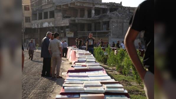 Literature returns to Mosul two years after Islamic State's occupation, amid efforts to rebuild spirit of the city