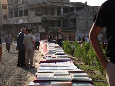 Literature returns to Mosul two years after Islamic State's occupation, amid efforts to rebuild spirit of the city