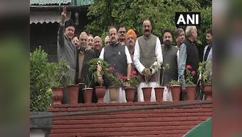 Two months into house arrest, Farooq Abdullah meets NC leaders at Srinagar residence; flashes 'victory' sign