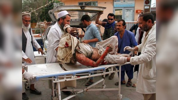 Afghanistan mosque explosion: 70, including 27 schoolchildren, dead; villagers search for bodies of missing