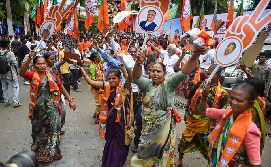 BJP workers celebrated their victory in Maharashtra Assembly election, outside the party office in Mumbai. PTI