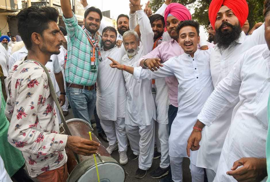 Congress supporters celebrated a party candidate's win in the Assembly election, in Haryana's Karnal. PTI