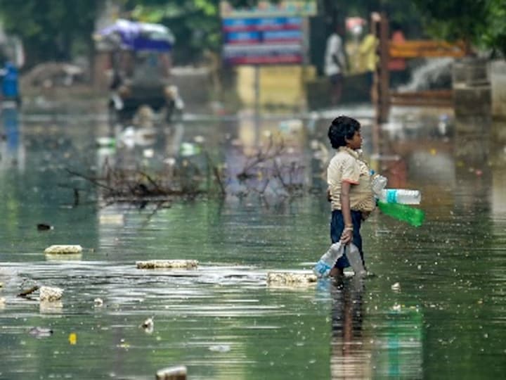 Watch: Villagers take sick man to hospital on makeshift boat in flooded Bihar