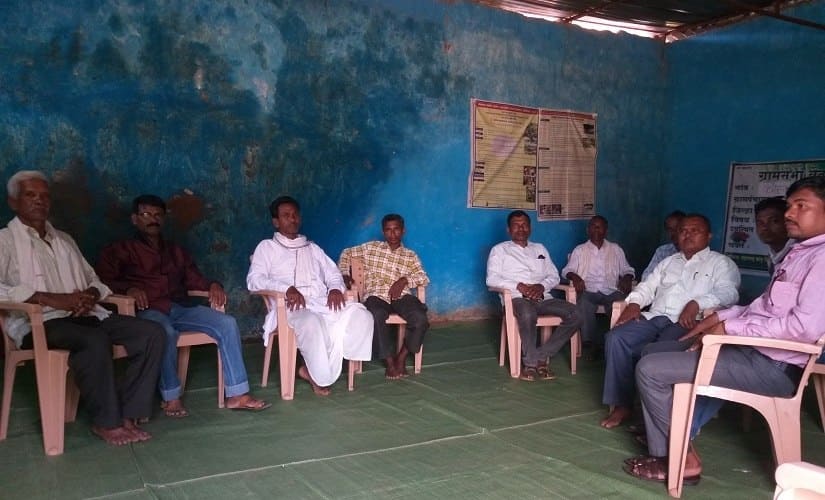 President of the Maha Gram Sabha, Jhanduram Salame (centre-right), with other members. Firstpost/Natasha Trivedi