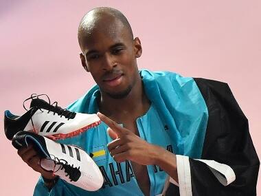 Steven Gardiner poses for a photograph after winning goal at World Athletics 