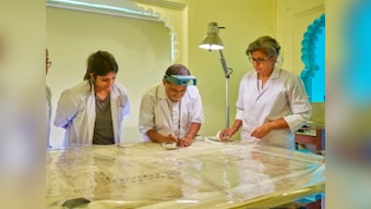 At Udaipur's City Palace painting conservation lab, centuries-old artworks meet modern technology and an expert touch