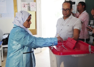 Voting begins for Tunisian presidential runoff; law professor Kais Saied takes on media magnate Nabil Karoui